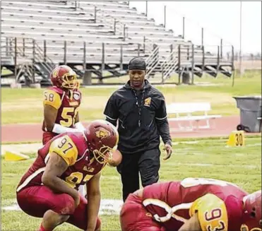  ?? NICK NOVY/CONTRIBUTE­D ?? Central State volunteer assistant football coach Loyd Bradley Jr., instructs during a recent practice. Bradley played high school football in Texas, then in college at the Air Force Academy.