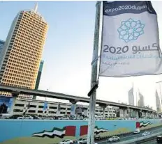 ??  ?? Riding high Expo banners near the Dubai World Trade Centre.
Clint Egbert/ Gulfnews