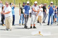  ?? Clint Egbert/Gulf News ?? Students from schools across the country assembled at Dubai Parks and Resorts to launch their model rockets yesterday.