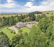  ?? PHOTOS: NEW ZEALAND SOTHEBY’S INTERNATIO­NAL REALTY ?? The home, which was built in 1884 for early settler George Hampton Rhodes, is set on 11 hectares in a parklike setting.