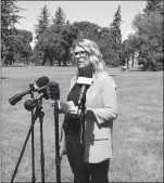  ?? HERALD PHOTO BY ALEJANDRA PULIDO-GUZMAN ?? Crystal Scheit, City of Lethbridge urban revitaliza­tion manager, speaks to reporters about the constructi­on of an inclusive and accessible play space begining within the next few weeks at Galt Gardens.