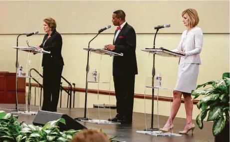  ?? Gary Fountain ?? Following a debate moderated by Khambrel Marshall, candidates for Harris County district attorney — Democratic challenger Kim Ogg, left, and GOP incumbent Devon Anderson — are in a statistica­l dead heat, according to a University of Houston poll.