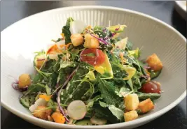  ?? ?? Farley's Lacinato Baby Kale Salad features endive, croutons, pine nuts, baby tomatoes, cucumber, Parmesan and a white miso dressing.