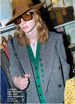  ?? ?? A sharply tailored blazer worn with retro flourishes at Gucci
HA HA HA