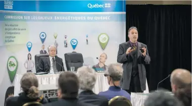  ?? DARIO AYALA/ THE GAZETTE ?? Commission co-chairs Normand Mousseau, standing, and Roger Lanoue, head the public consultati­on on energy issues in Quebec, heard from several groups in Montreal on Wednesday and will hold more hearings Thursday.