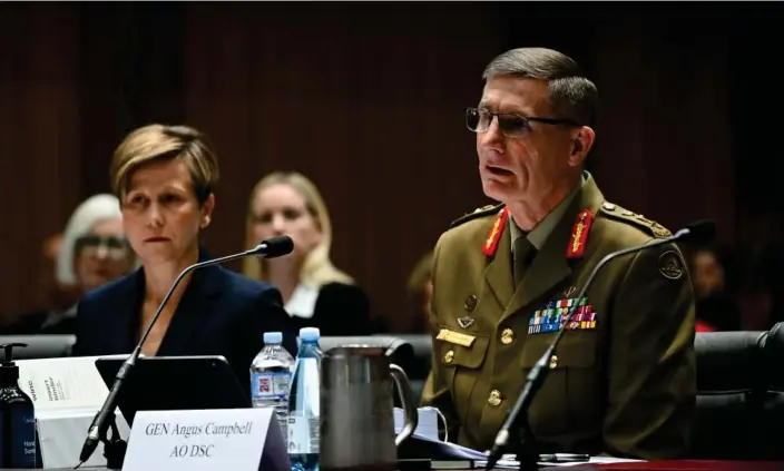  ?? Photograph: Lukas Coch/AAP ?? Chief of the Australian Defence Force, Gen Angus Campbell, speaks during Senate Estimates. He said he did not receive special treatment during a review of troops in Afghanista­n.