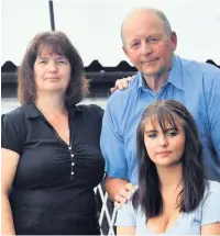  ??  ?? Emily Hughes with her mum and dad, Peter and Susan