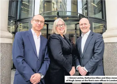  ??  ?? > Simon Levine, Katherine Allen and Alun Jones of Hugh James at the firm’s new offices in London