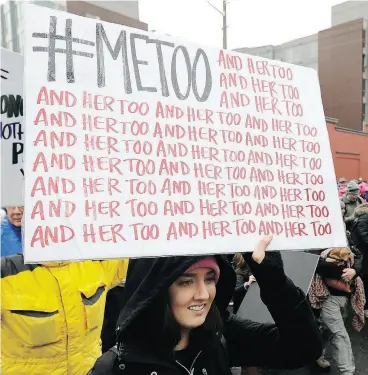  ?? TED S. WARREN / THE ASSOCIATED PRESS FILES ?? A marcher carries a sign with the popular Twitter hashtag #MeToo used by those speaking out against sexual misconduct at a demonstrat­ion in Seattle last month.