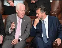  ?? J. SCOTT APPLEWHITE / AP FILE ?? Sen. John Cornyn, R-Texas, center, and Sen. Ted Cruz, R-Texas, right, speak together, in the House chamber as they await a speech at the Capitol in Washington on May 17.