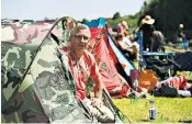 ??  ?? Des Robson, 48, was first in the queue at the Wimbledon campsite