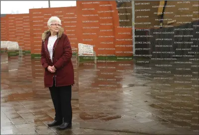  ??  ?? Hope visits the Clydebank asbestos memoriam, where her husband David is honoured alongside countless others