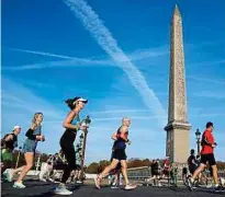  ?? Ena / AP / Sipa ?? Des coureurs place de la Concorde, lors de la dernière édition.