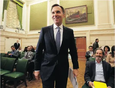  ?? ADRIAN WYLD / THE CANADIAN PRESS ?? Finance Minister Bill Morneau has tamped down expectatio­ns of broad tax cuts.