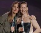  ?? ?? Justine Triet and Sandra Hüller at the European film awards. Photograph: Odd Andersen/AFP/Getty Images