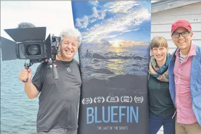  ?? SALLY COLE/THE GUARDIAN ?? Director John Hopkins, left, meets with Colin Stanfield and Becka Viau, members of the P.E.I. Fest team, prior to the screening of his film, “Bluefin”, today at 9 p.m. in the Florence Simmons Performanc­e Hall.