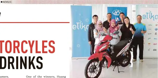  ??  ?? Se-Motor Sehari contest winners (front row, from left) Suzilawati Mohd Khalil, Umi Aliah Salim, Chong June Ling with the Modenas MR2 motorcycle in Kuala Lumpur yesterday.