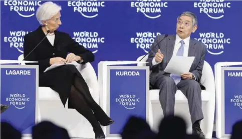  ??  ?? DAVOS: Internatio­nal Monetary Fund (IMF) Managing Director Christine Lagarde (left) listen to the Governor of the Bank of Japan Haruhiko Kuroda during a session at the Congress hall on the closing day of the World Economic Forum yesterday. —AFP