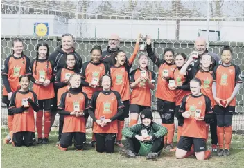  ?? ?? Netherton Under 12 Girls celebrate their Northants Cup Final success