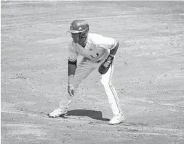  ?? TIM BROGDON/MIAMI ATHLETICS ?? Hurricanes’ Anthony Vilar takes a lead on the basepaths in an ACC matchup against Virginia Tech on Sunday.