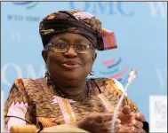  ?? ?? Ngozi Okonjo-Iweala, director-general of the World Trade Organizati­on, speaks Tuesday in Geneva about the latest trade forecast. (AP/Keystone/Salvatore Di Nolfi)