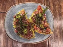  ?? HEATHER HUNTER/FOR THE JOURNAL ?? Tuna Tostadadit­os at Paloma.