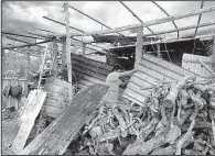  ?? AP/EDUARDO VERDUGO ?? A man searches the rubble of his home Saturday in Tecolutla in Mexico’s Veracruz state after Hurricane Katia hammered the area Friday night.