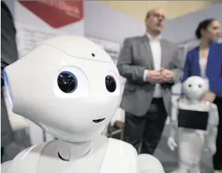  ?? P E T E R J. T H O MP S O N / NAT I O NA L P O S T ?? Pepper the robot was popular at the recent DX3 conference in Toronto, where new products designed to improve shopping experience­s are showcased. Pepper can answer simple questions.