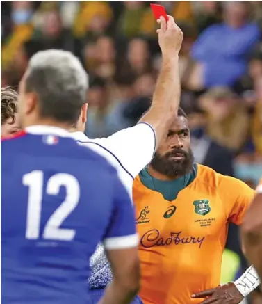  ??  ?? Referee Ben O’Keeffe shows Wallabies winger Marika Koroibete a red card just five minutes into the first half of their game against France at Suncorp Stadium on July 17, 2021.