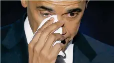  ?? GETTY IMAGES ?? El presidente Obama enjugó lágrimas la noche del martes.