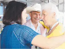  ??  ?? Mayor Tom Tate and wife Ruth catch up with Dawn Fraser.