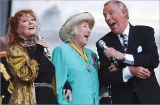  ?? Edmond Terakopian/PA via AP, File Photo ?? In this July 10, 2005 file photo, Dame Vera Lynn, centre, singer Petula Clark, left and entertaine­r Bruce Forsyth sing “We’ll Meet Again” during the Second World War 60th Anniversar­y Service at Horse Guards Parade, in London.