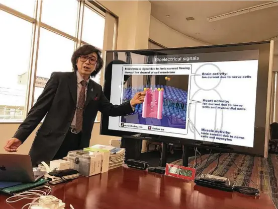  ?? Photos by Don Lee / Los Angeles Times ?? Yoshiyuki Sankai, founder and chief executive of Cyberdyne Inc., describes his company’s products in Tsukuba, Japan.