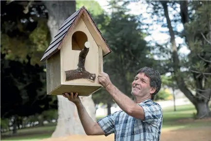  ?? JOHN BISSET/STUFF ?? Timaru man Alistair Thornley has constructe­d nesting boxes for the owls that live in the Botanic Gardens.