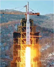  ?? FILE PHOTO ?? In this December 12, 2012 photo released by the Korean Central News Agency, North Korea’s Unha-3 rocket lifts off from the Sohae launch pad in Tongchang-ri, North Korea