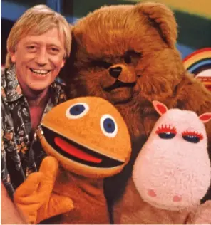  ??  ?? Colourful characters: Geoffrey Hayes with Zippy, Bungle and George