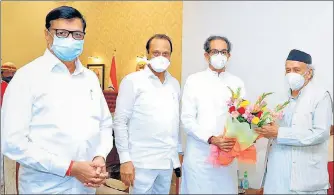  ?? PTI ?? (From left) Revenue minister Balasaheb Thorat, deputy chief minister Ajit Pawar and chief minister Uddhav Thackeray with Governor BS Koshyari at Raj Bhavan on Wednesday.