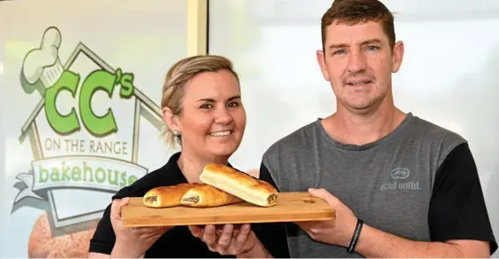  ??  ?? NUMBER ONE: CC’s on the Range Bakehouse owners Carla and Craig Trudgett with their award-winning sausage rolls.