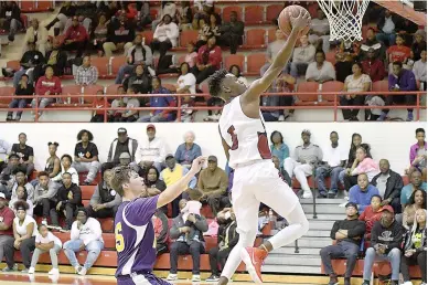  ??  ?? above Arkansas High’s Fabian Phillips goes up for a layup against Bradley on Tuesday at Razorback gym in Texarkana, Ark. Arkansas High won, 89-54.