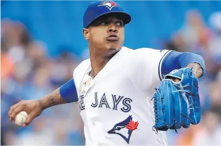  ?? NATHAN DENETTE / THE CANADIAN PRESS ?? Blue Jays starting pitcher Marcus Stroman throws against the Baltimore Orioles in the first inning of Toronto’s win at Rogers Centre on Wednesday night.