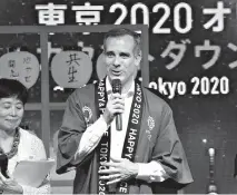  ?? AP Photo/Koji Sasahara ?? ■ Mayor Eric Garcetti of Los Angeles, the host city of the 2028 Olympic and Paralympic Games, speaks during the countdown event of Tokyo 2020 on Tuesday in Tokyo.