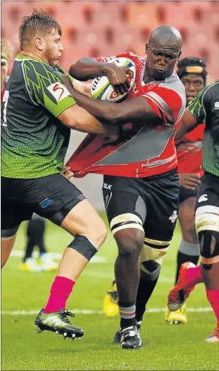  ?? Picture: MICHAEL SHEEHAN ?? BRISTLING WITH CONFIDENCE: Loose forward Thembelani Bholi on the charge for the Southern Kings during their warm-up match against the SWD Eagles. Bholi has gained confidence during the team’s warm-up games after returning from injury