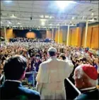  ?? OSSERVATOR­E ROMANO/AFP ?? Pope Francis (centre) waves to the public during his visit to the Pontifical Catholic University of Chile in Santiago on January 17.