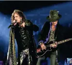  ?? EMMA MCINTYRE/GETTY IMAGES FOR THE RECORDING ACADEMY ?? Steven Tyler and Joe Perry, of Aerosmith, perform during the 62nd Annual Grammy Awards at STAPLES Center on Jan. 26, 2020, in Los Angeles.