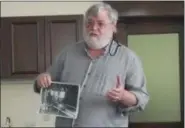  ?? KEITH REYNOLDS — THE MORNING JOURNAL ?? Retired Lorain Water Purificati­on Plant Superinten­dent William D. Gollnitz presented part two of his historical talk on the history of the plant May 26 at the Lorain Historical Society Carnegie Center, 329 West 10th Street, Lorain.