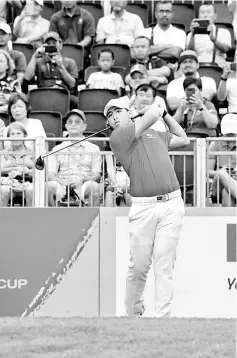  ??  ?? Asia team golfer Gavin Green tees off on the first hole during the final round of EurAsia Cup golf tournament. — Bernama photo