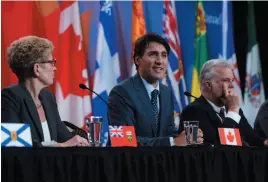  ?? CP PHOTO ?? Prime Minister Justin Trudeau speaks as he takes part in a press conference following the First Ministers Meeting in Ottawa on Tuesday.