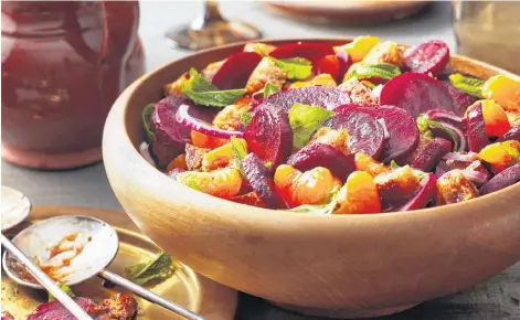  ?? CONTRIBUTE­D ?? A roasted beet and mandarin panzanella salad is a perfect choice for Eat Together Day, which is being held on June 14.