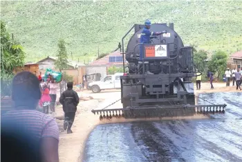  ?? — Picture: Tinai Nyadzayo ?? Bitumen Resources started the rehabilita­tion of Jeff-Hobhouse Road in Chikanga, Mutare, on Sunday. The project is running under the Emergency Road Rehabilita­tion Programme 2 which has seen the province’s road network getting a facelift.