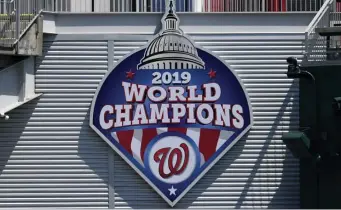  ?? AP ?? FULL MARKS: Before adding an asterisk to the 2020 World Series champs, consider the risks players and staff took to stage the 2020 season.
